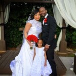 Romby Bryant, his wife, and oldest daughter.