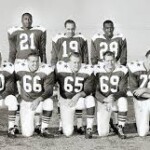 Starting line up of the Dallas Texans team with Jon Gilliam as center.