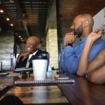 Christina Curtis, Romby Bryant, and Larry Mallory Preparing for the first episode of The Extra Point.